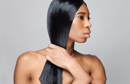woman flaunting her beautiful black hair